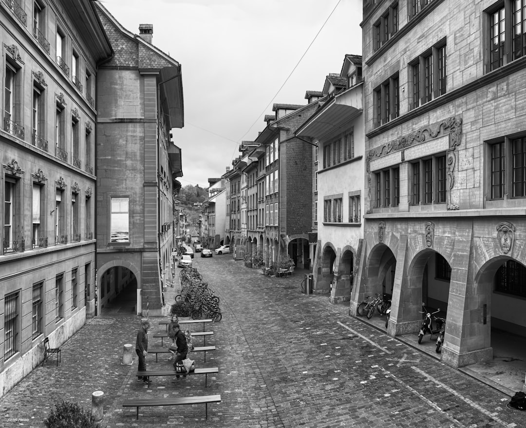 A narrow street lined with old buildings.